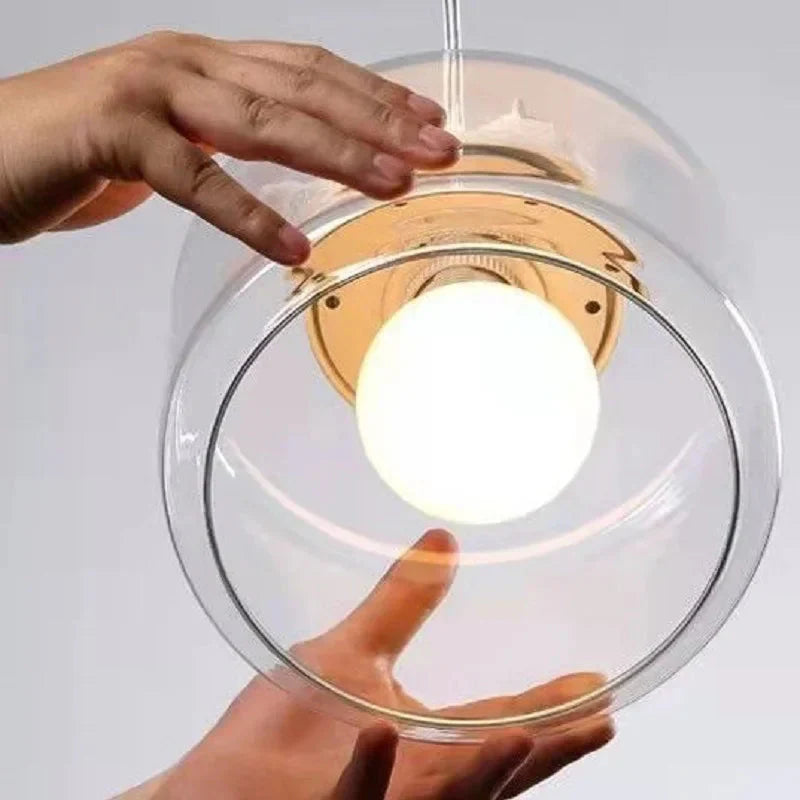 Avelora | Pendelleuchte mit Vogel und Glaszylinder