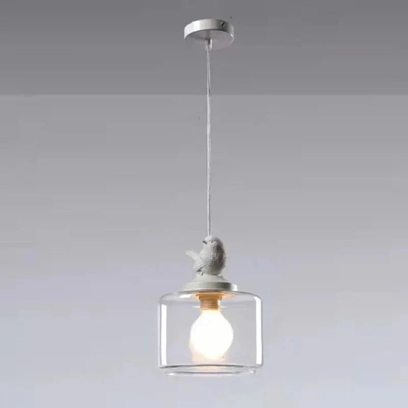 Avelora | Pendelleuchte mit Vogel und Glaszylinder