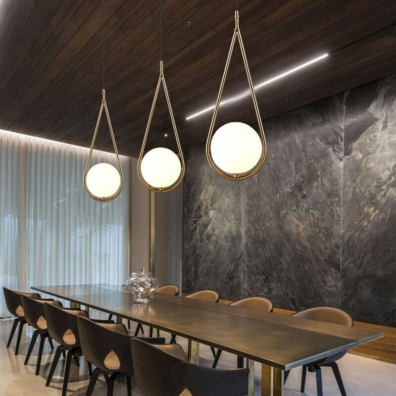 Aurea | Goldene LED Pendelleuchte Tropfenform Modern